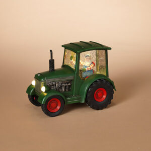 Santa in green tractor water globe