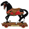 black pull toy horse figurine with red saddle blanket and bridle